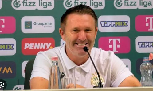 „Az otthonom itt van, és vissza fogok térni.” – mondta Robbie Keane, a Ferencváros vezetőedzője, aki egyben egykoron a világ élvonalába tartozó, nagy tapasztalattal rendelkező sztárjátékos is. Keane januárban írta alá szerződését a klubbal, és azóta irányítja a csapatot.
